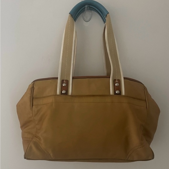 COACH 
•Sateen Leather 
•Gold outside 
•Blue interior 
•Satchel Handbag
•F11992 - Picture 2 of 6